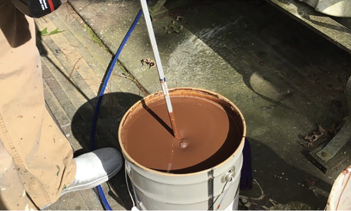 Paint mixing assures shed coating color, consistency